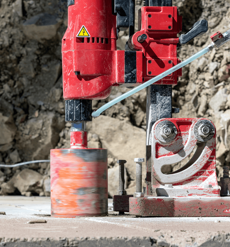 Heavy-duty asphalt drill bit designed for cutting clean holes in road surfaces and pavements.