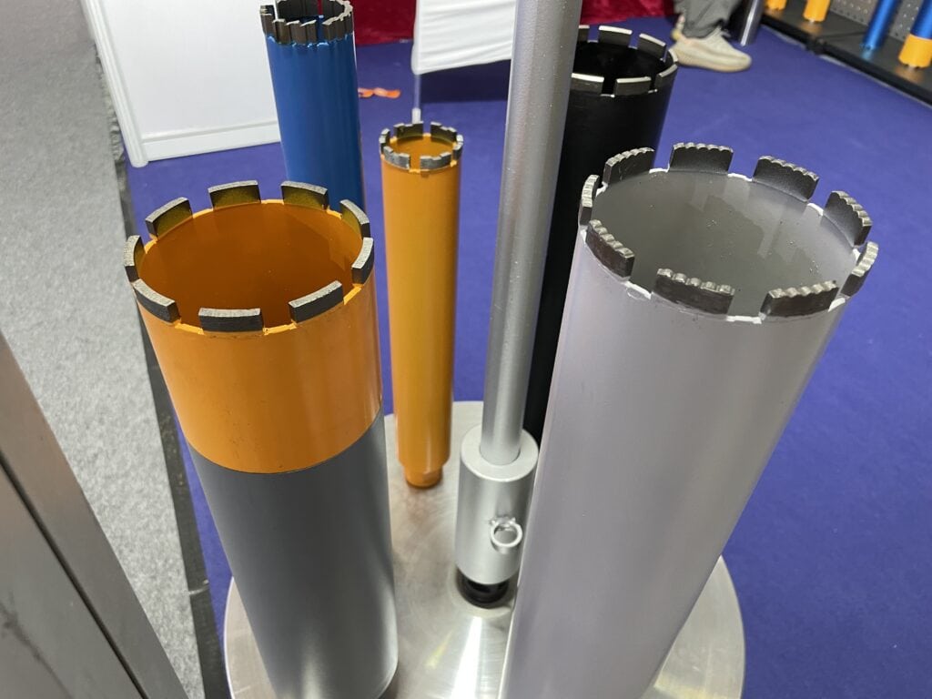 Close-up of the cutting edge of an asphalt drill bit with laser-welded segments for fast penetration.
