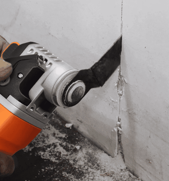 Oscillating tool blade designed for precise cutting, scraping, sanding, and grinding on various materials.