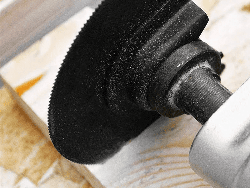 Oscillating tool blade designed for precise cutting, scraping, sanding, and grinding on various materials.